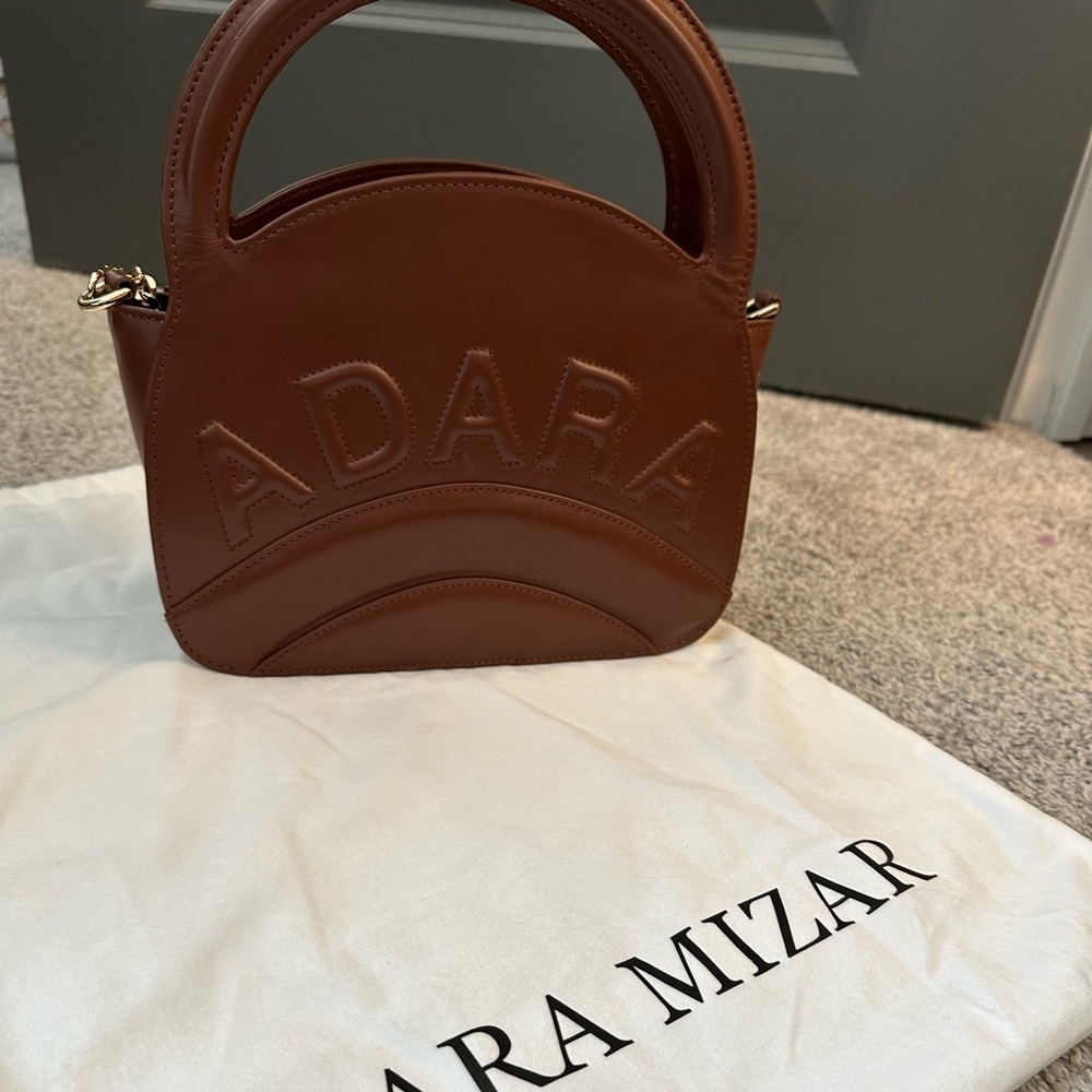 Black owned handbag, ADARA MIZAR. 100% leather